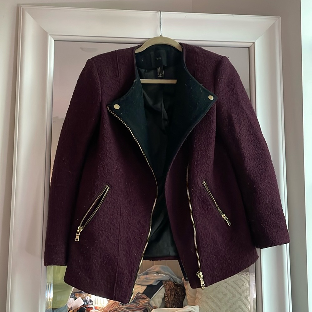 Moto style jacket. Will like material. Just needs a little dust bunny removal.